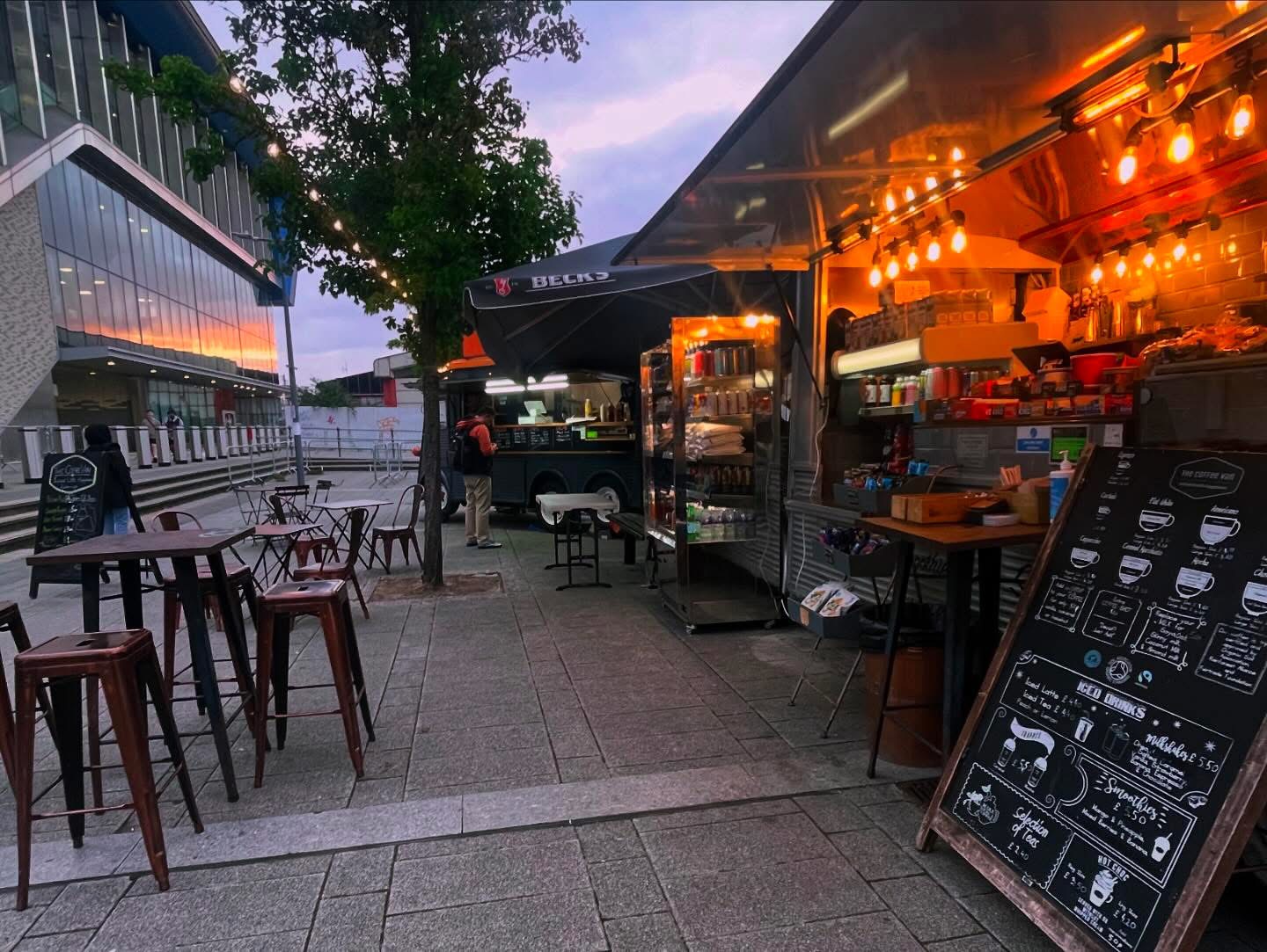 Coffee van in the evening with warm string lights